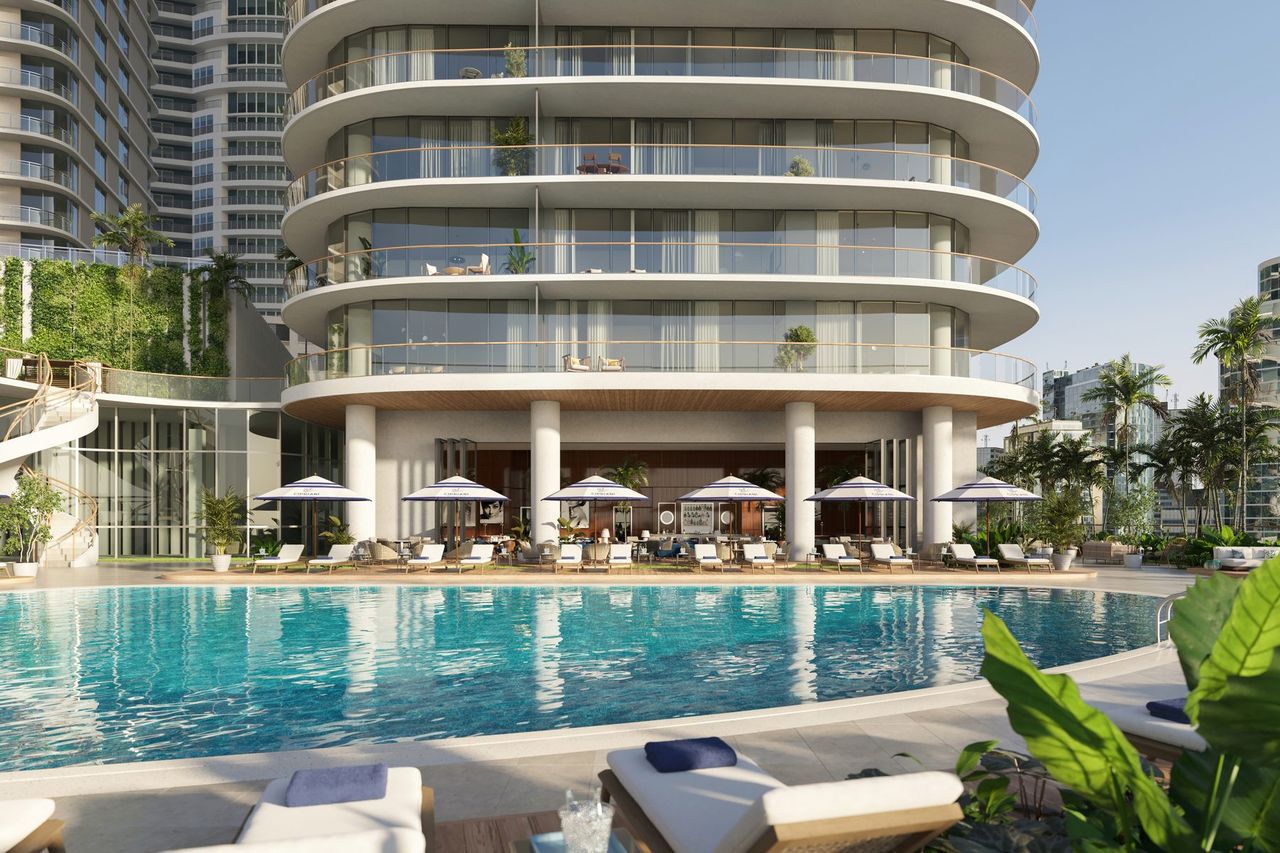 Resort pool deck with cabanas at Cipriani Residences Miami