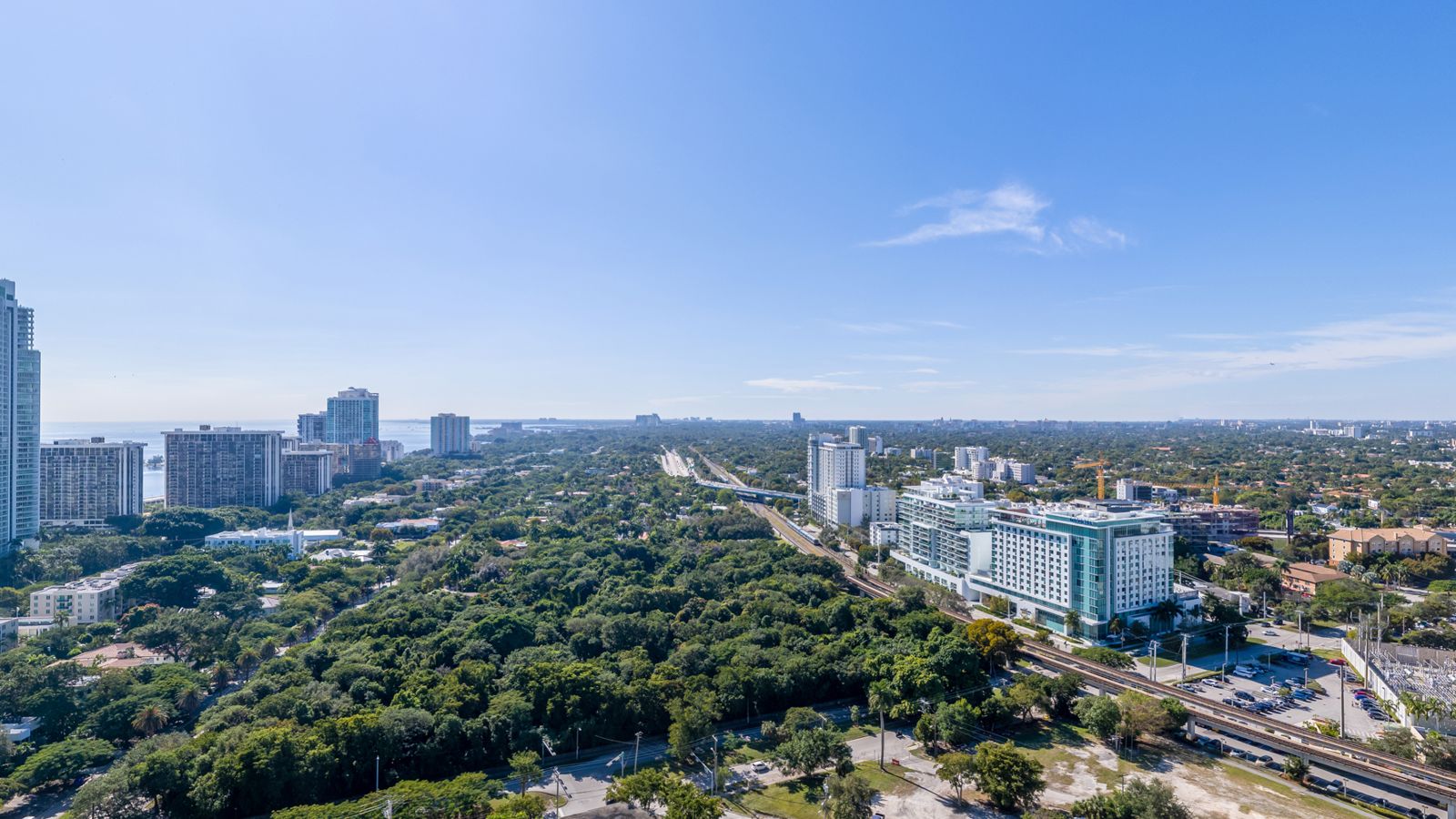 Cipriani Residences Miami, view southwest over Simpson Park and Coconut Grove from about 250 feet, near the 23rd floor, photographed from the site