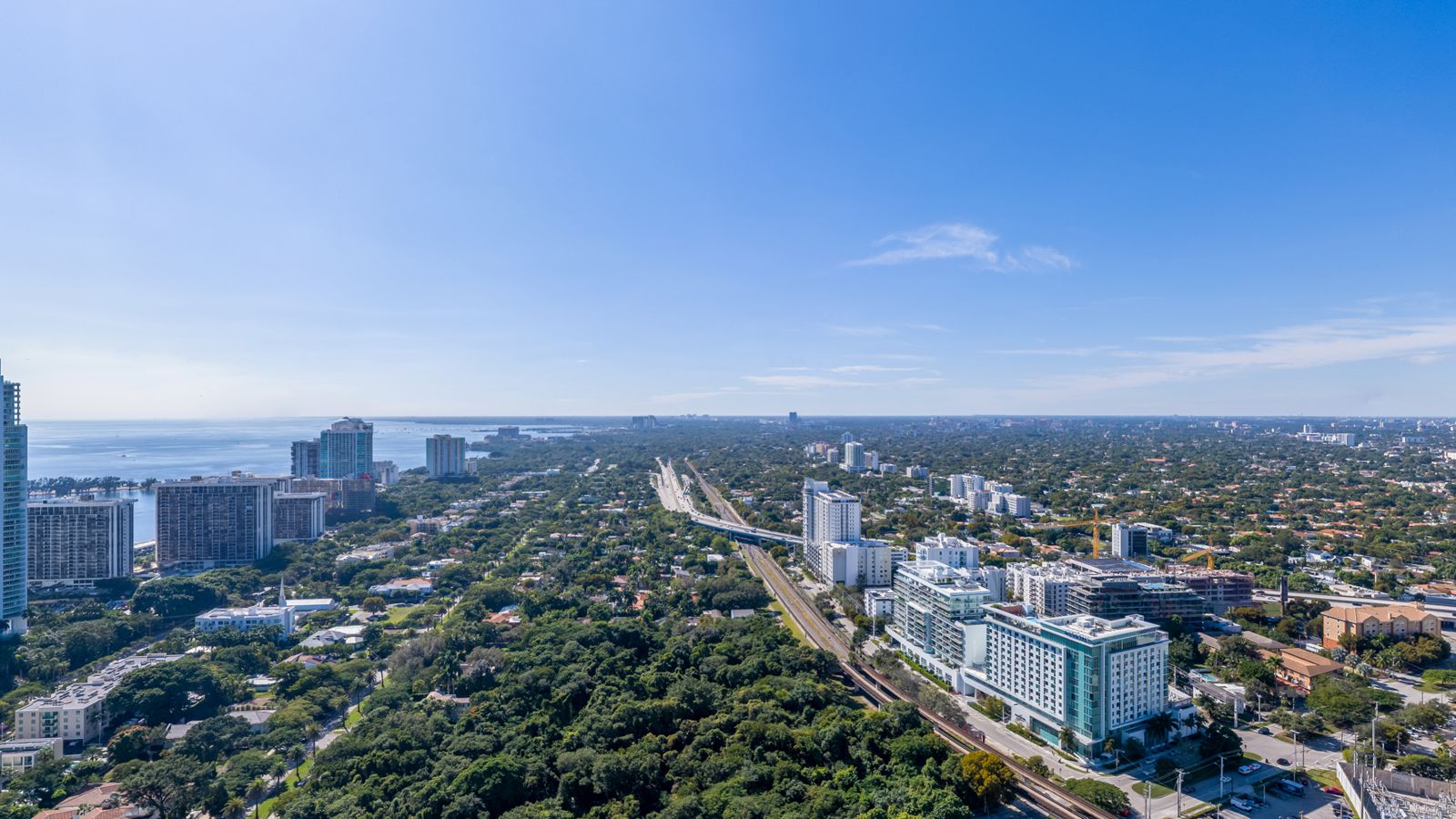 Cipriani Residences Miami, view southwest over Simpson Park and Coconut Grove from about 400 feet, near the 36th floor, photographed from the site