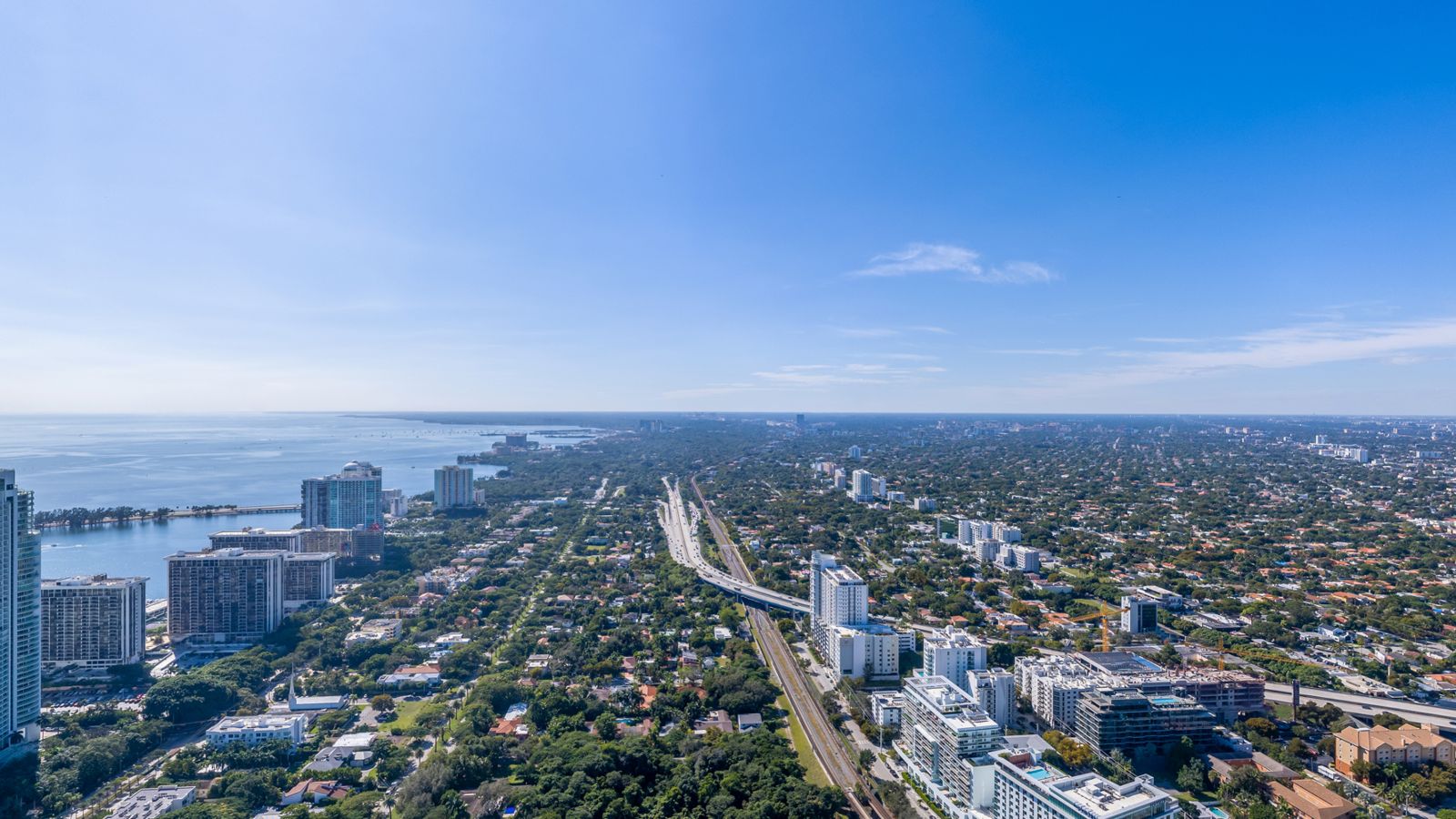 Cipriani Residences Miami, view southwest over Simpson Park and Coconut Grove from about 600 feet, near the 55th floor, photographed from the site