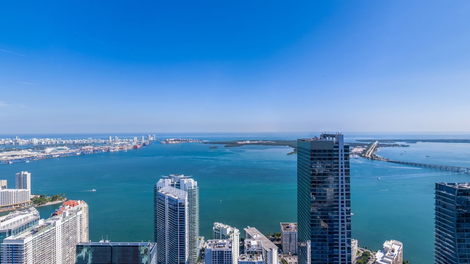 Cipriani Residences Miami, view east over the Brickell Avenue towers toward Biscayne Bay from about 750 feet, near the 69th floor, photographed from the site